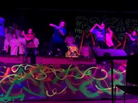 students dancing on stage 